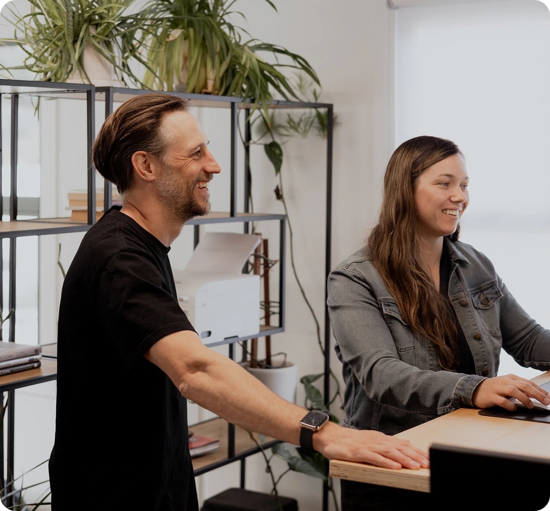 Two Data Story team members at work